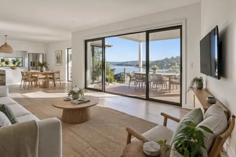Coastal living area onto a deck, video frame at 2.5s